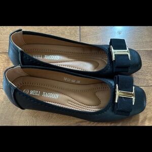 Black wedge shoes (Meili Jiaodian)